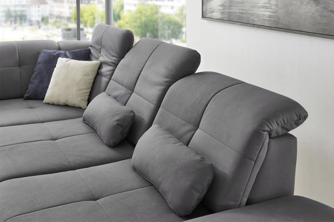 in16012 ecksofa variante links stoff mammut grau milieubild kopfteilverstellung detailbild 1