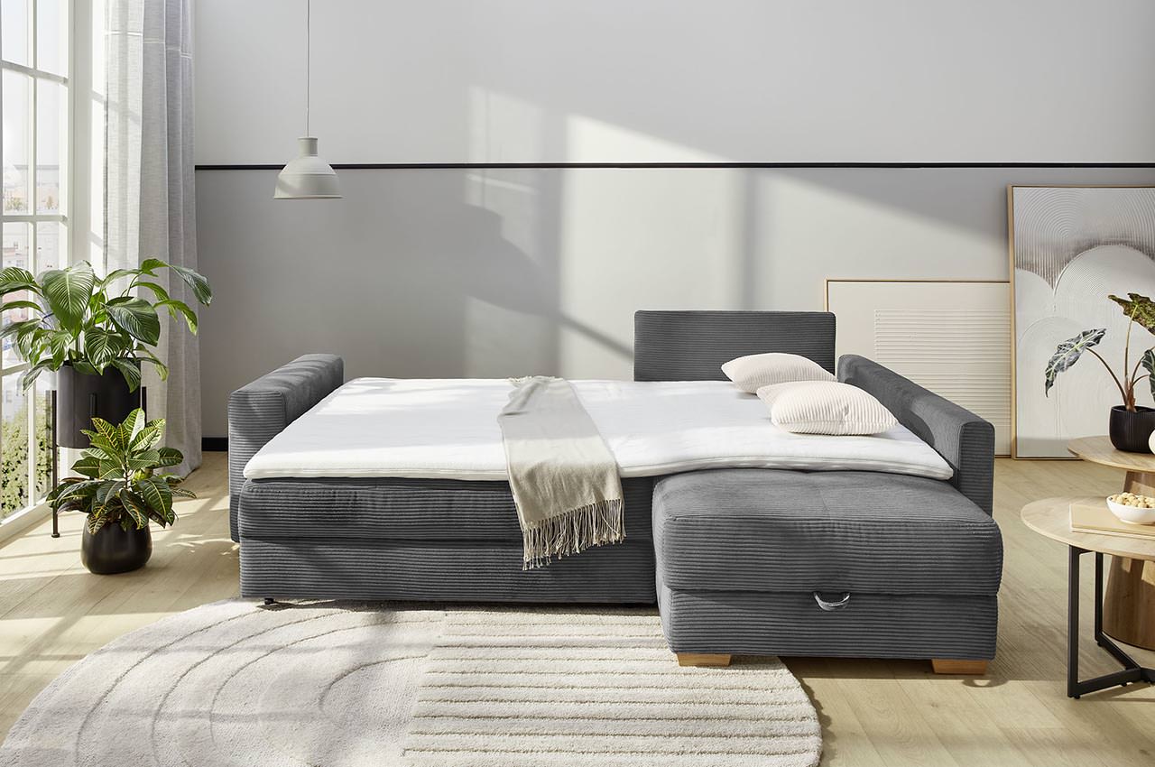 sunset ecksofa variante rechts cord 426 09 grau milieubild schlaffunktion mit topper