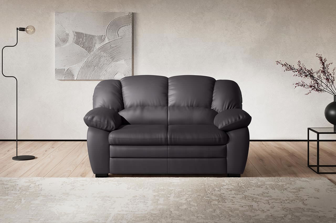 casino 2 er sofa von cotta kunstleder pulse d209 schwarz milieubild