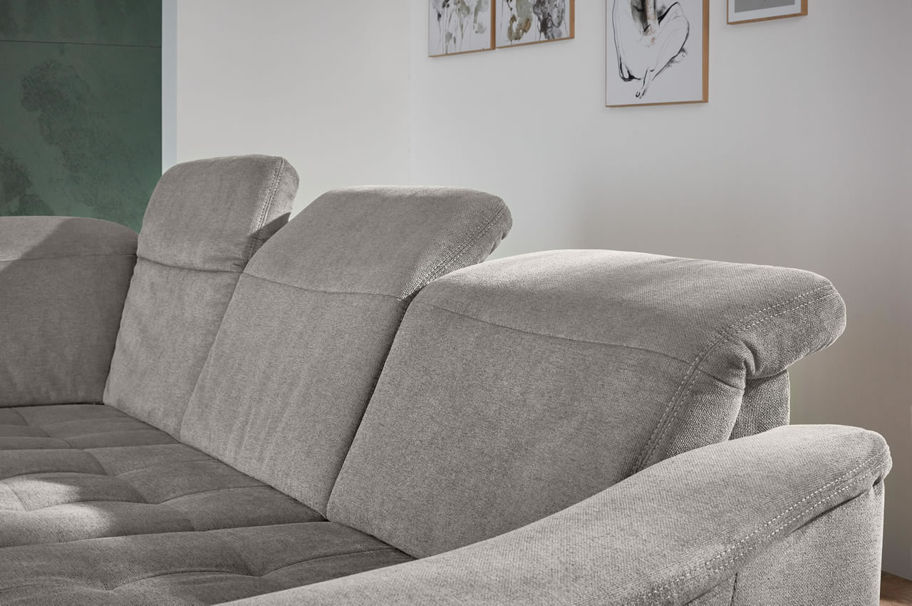 la23145 la16029 ecksofa inessa links stoff cyber farbe grau milieubild kopfteilverstellung detailbild