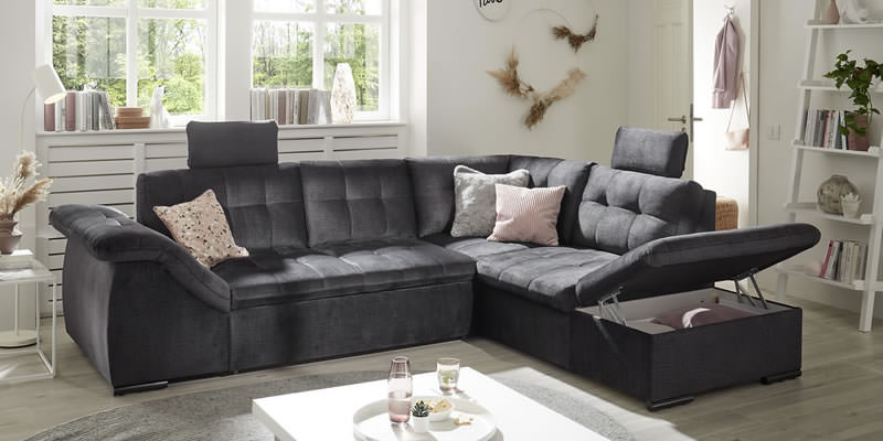 ecksofa-estrella-mit-farbigen-und-gemusterten-kissen
