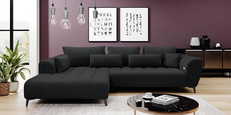 ecksofa-garay-vor-einer-farbigen-wand